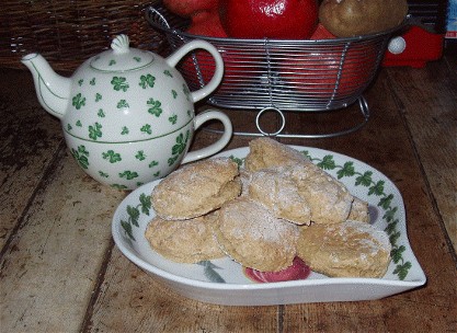 [Picture of a heart-shaped dish of round, brown scones]
